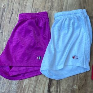 Two pairs of champion shorts